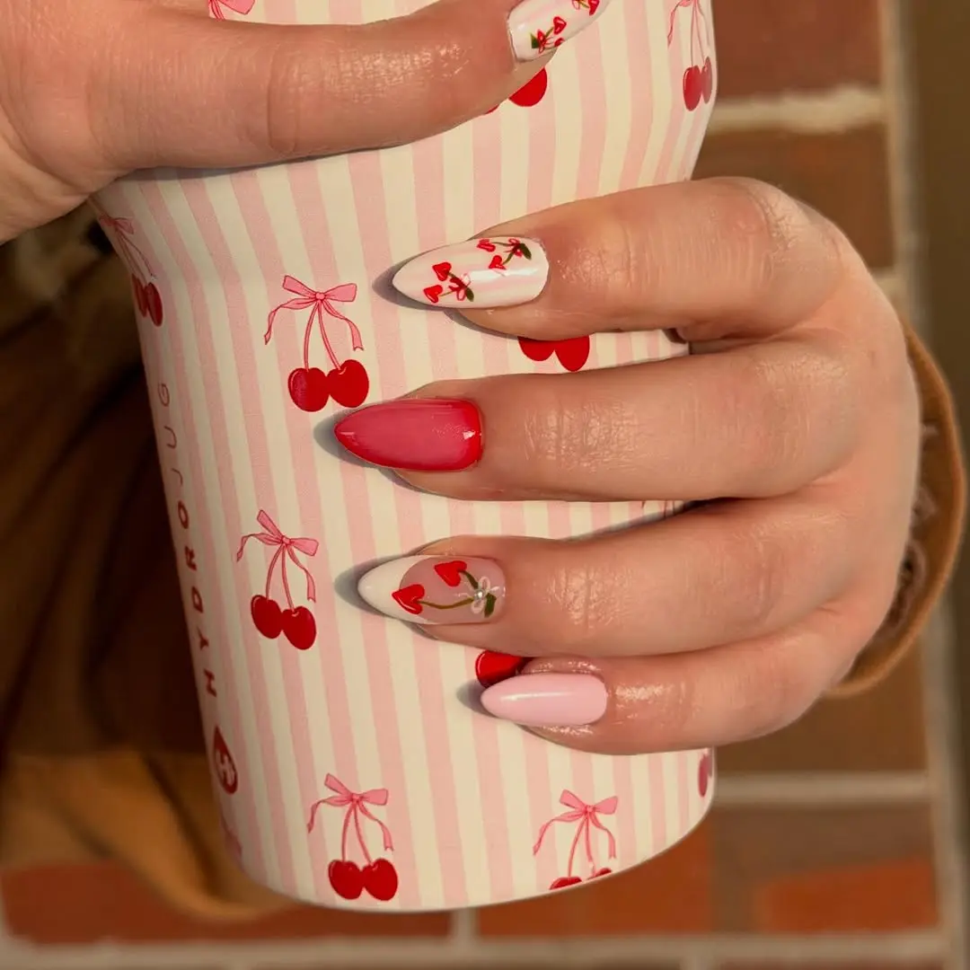 Charming cherry-themed nail design for February
