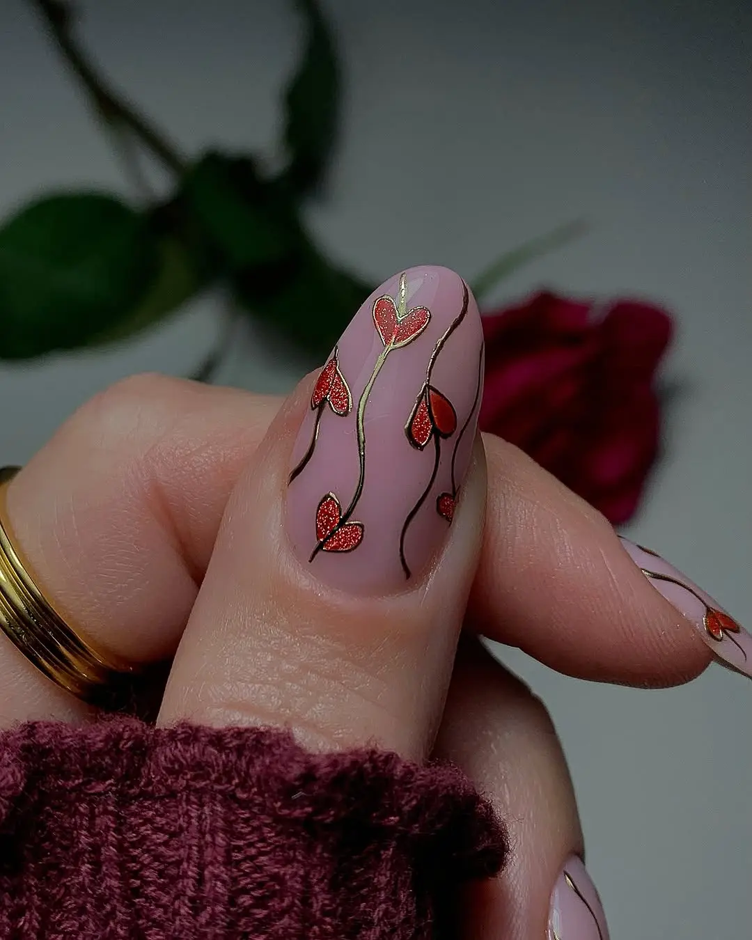Elegant pink nails with heart accents for February