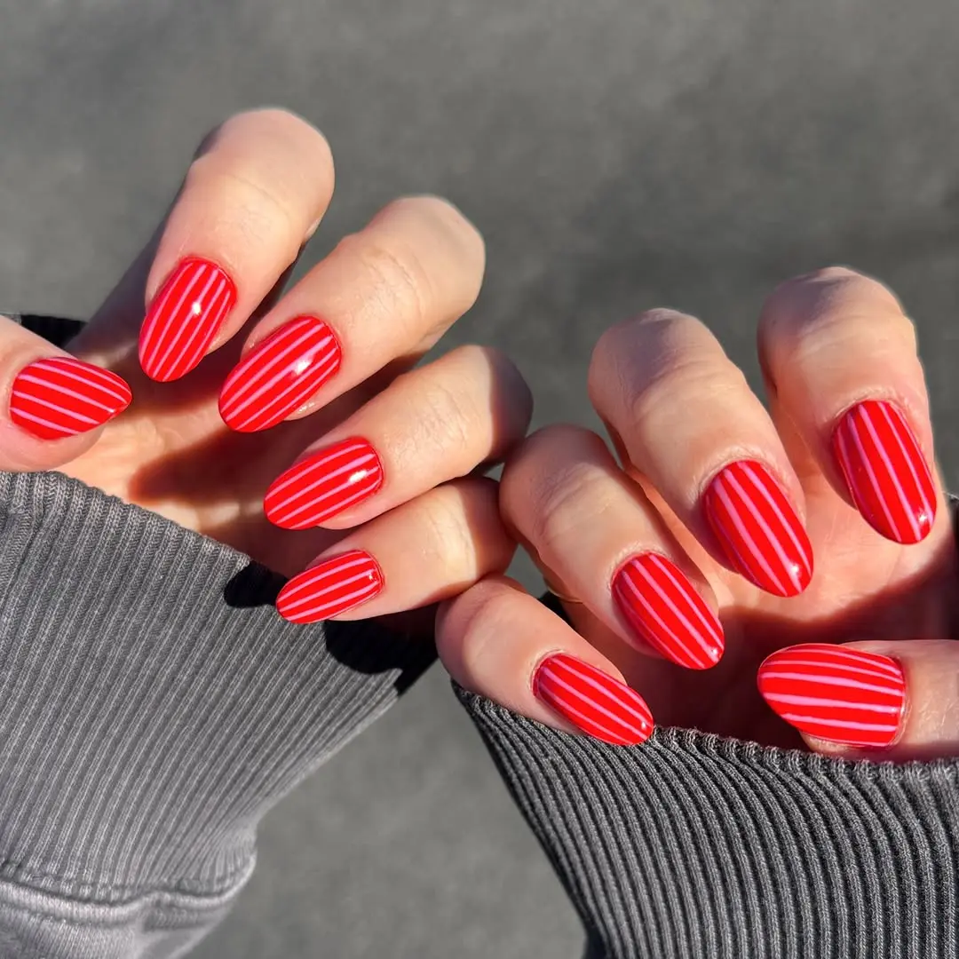 Bold Red Nails with Stylish Stripes