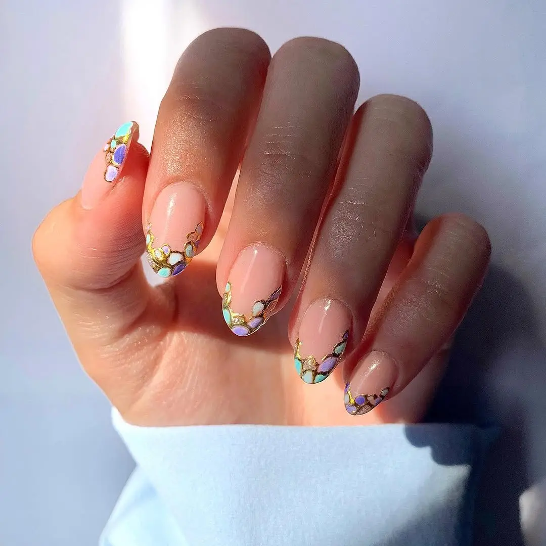 Elegant ombre graduation nails with colorful stones