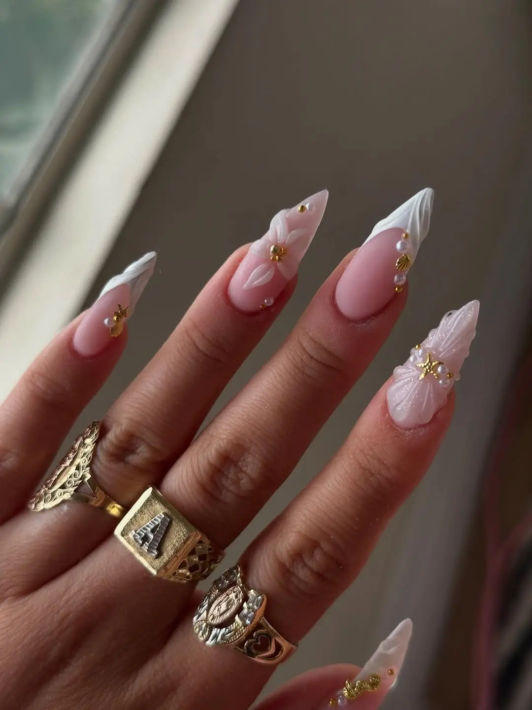 Elegant graduation nails with gold accents