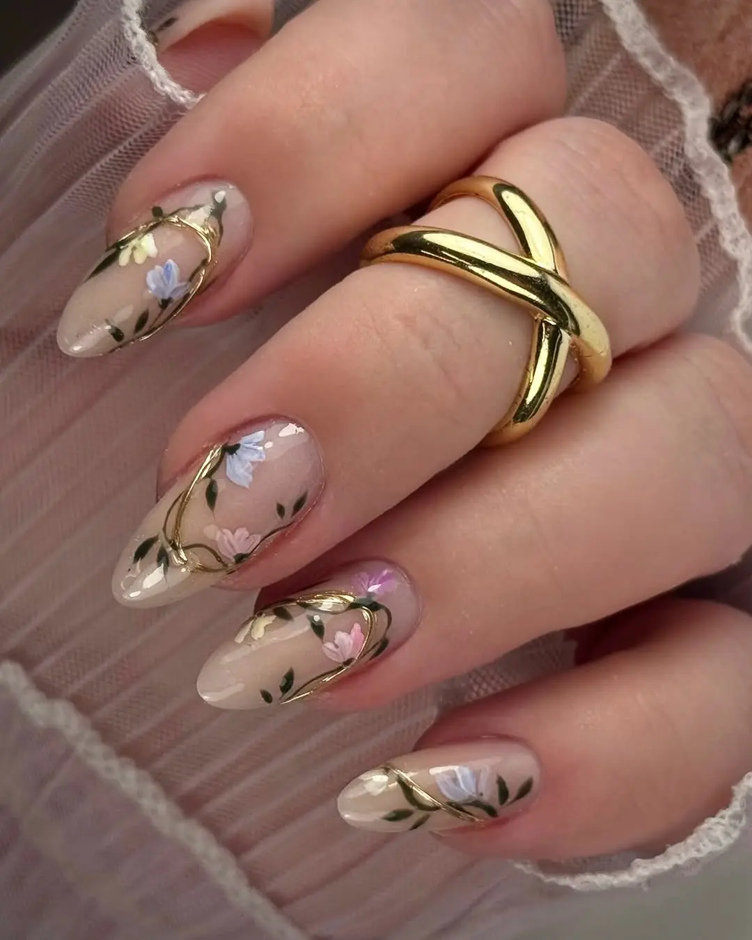 Elegant floral graduation nails with gold accents