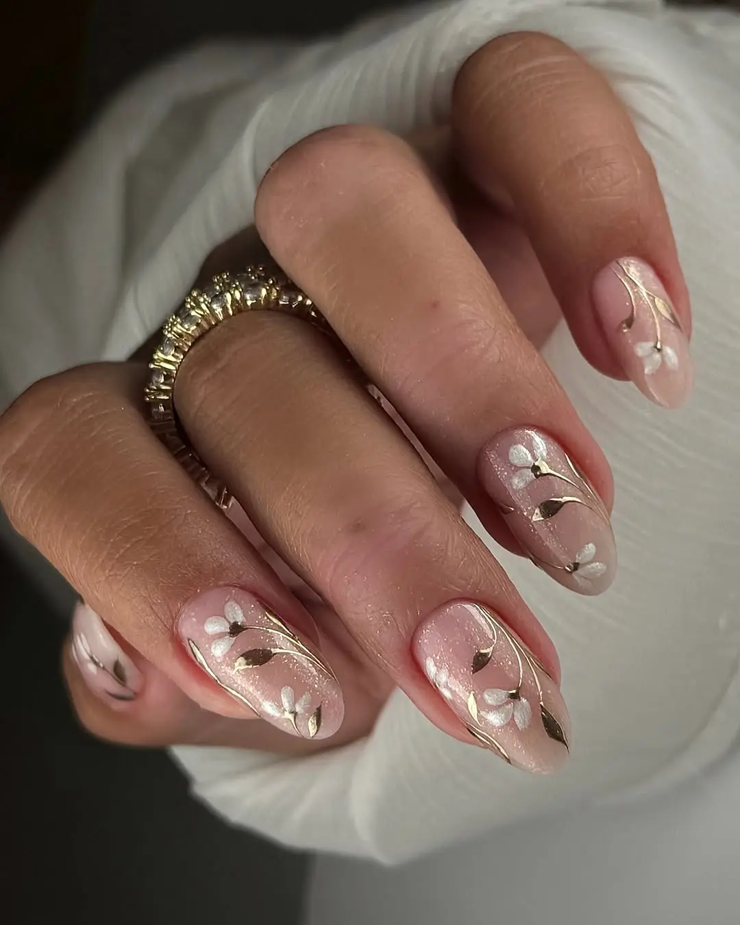 Elegant floral graduation nail art design