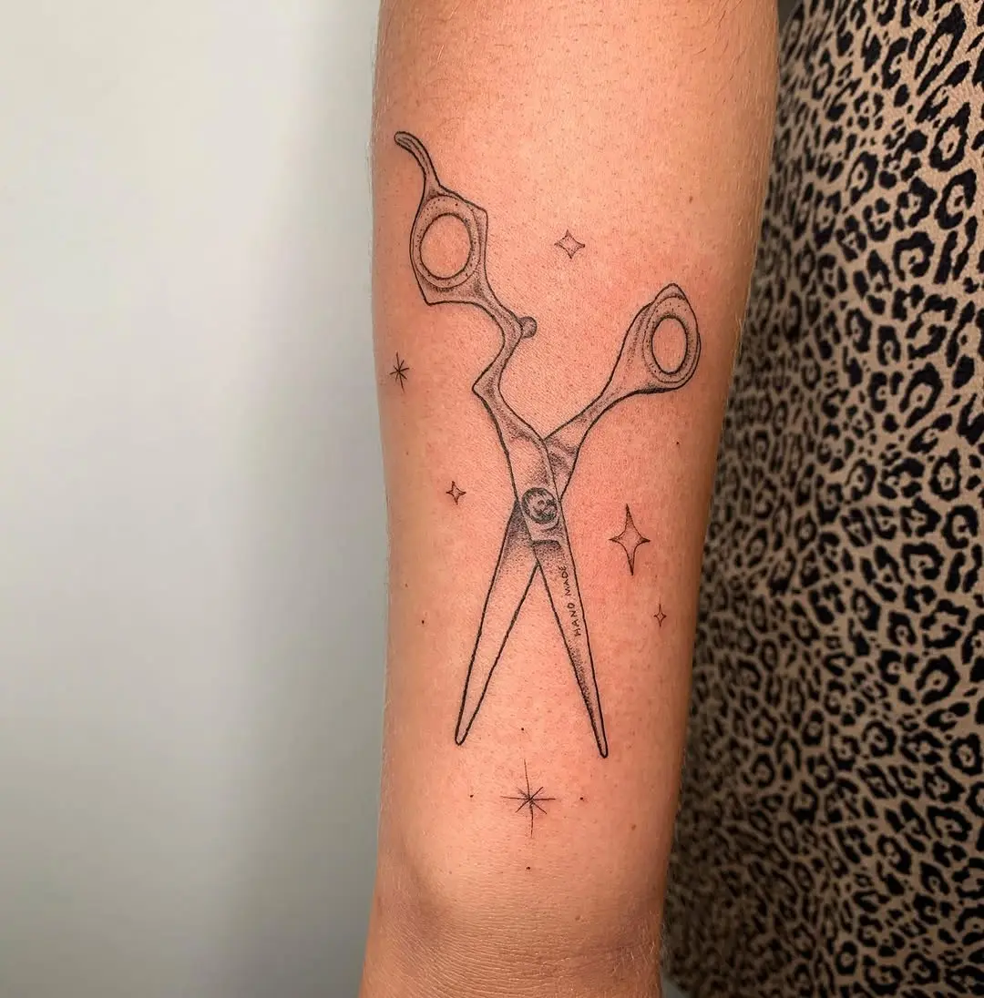 Stylish scissors tattoo for creative hair artists
