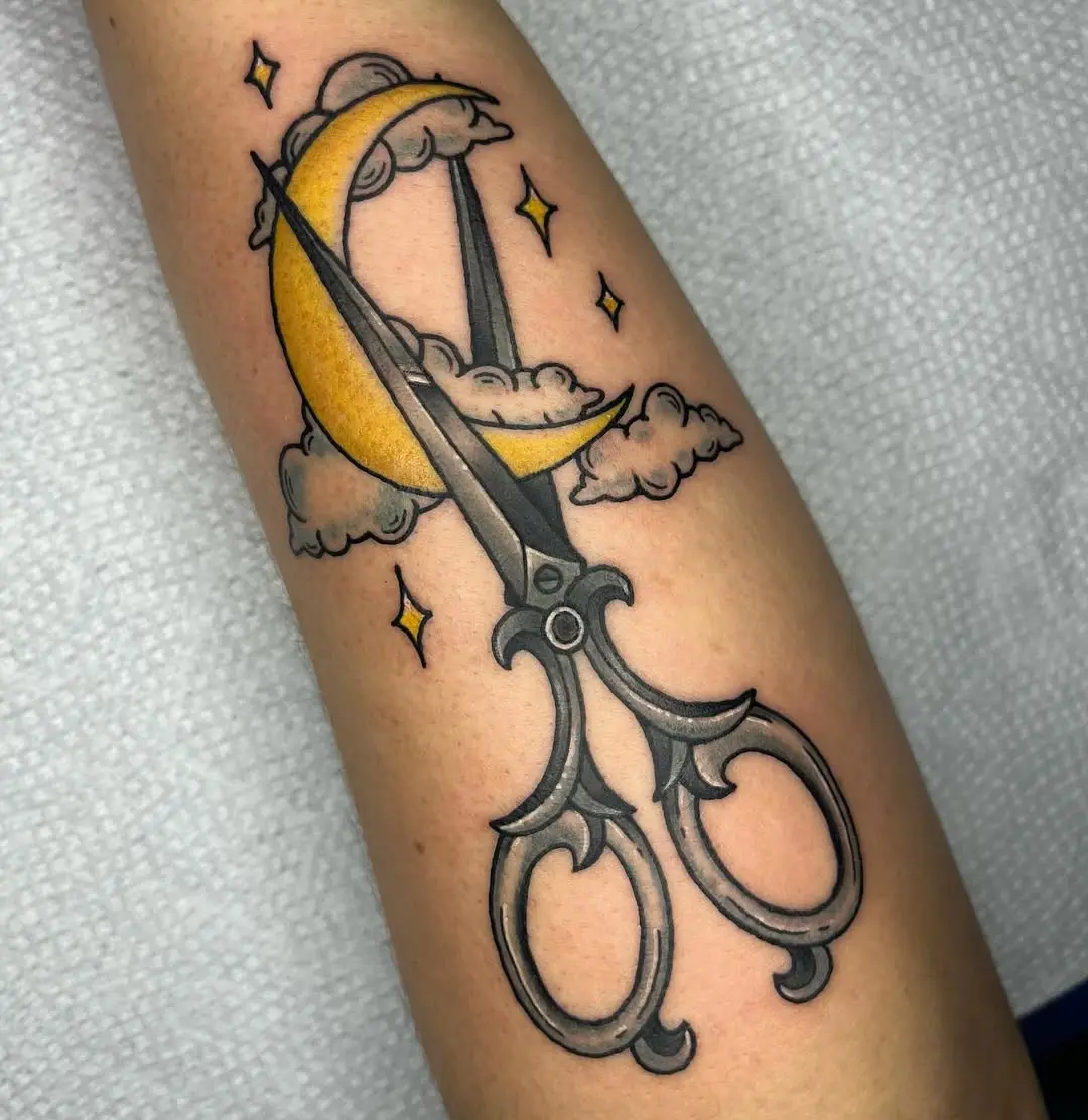 Whimsical scissors with moon and clouds