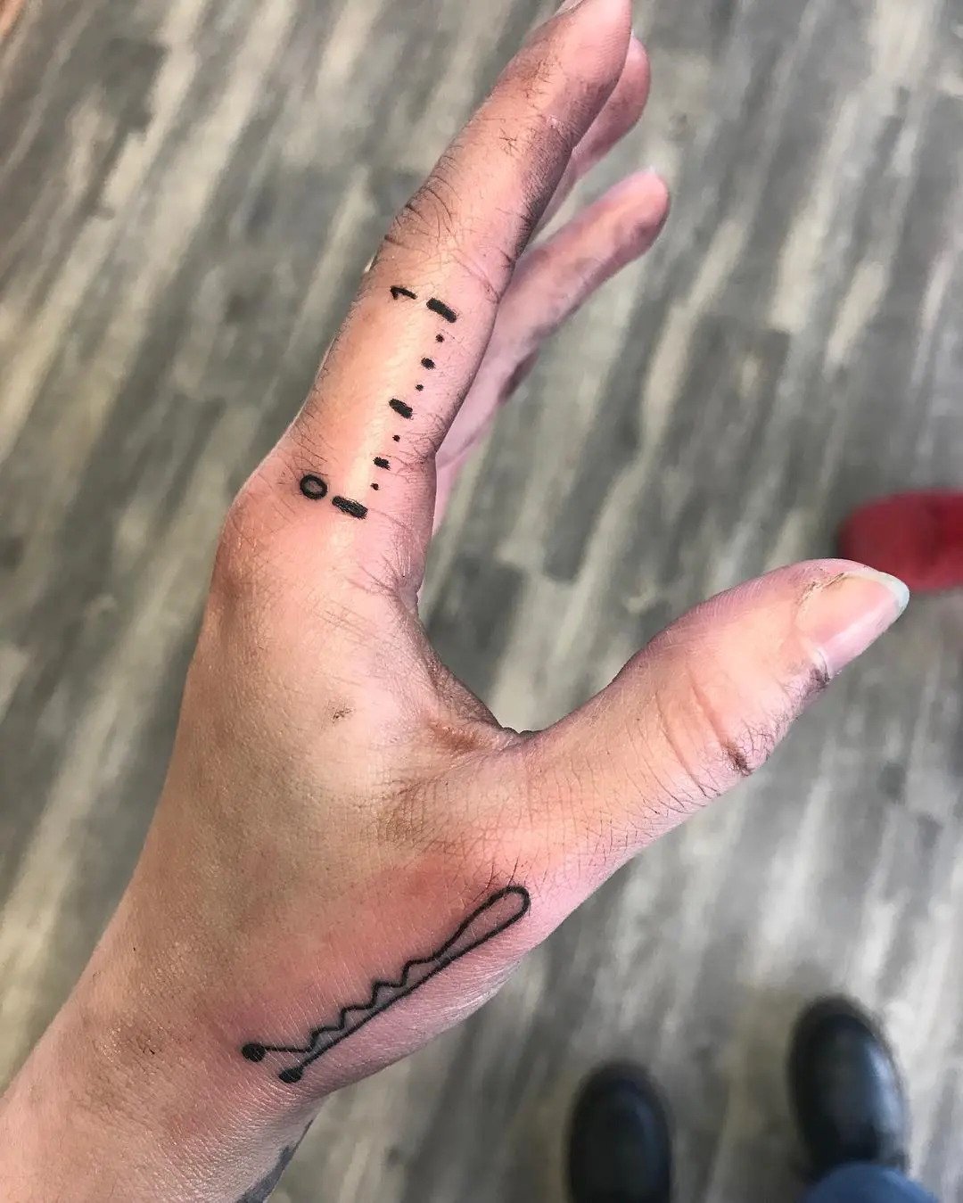 Minimalist Line Tattoo on Hand