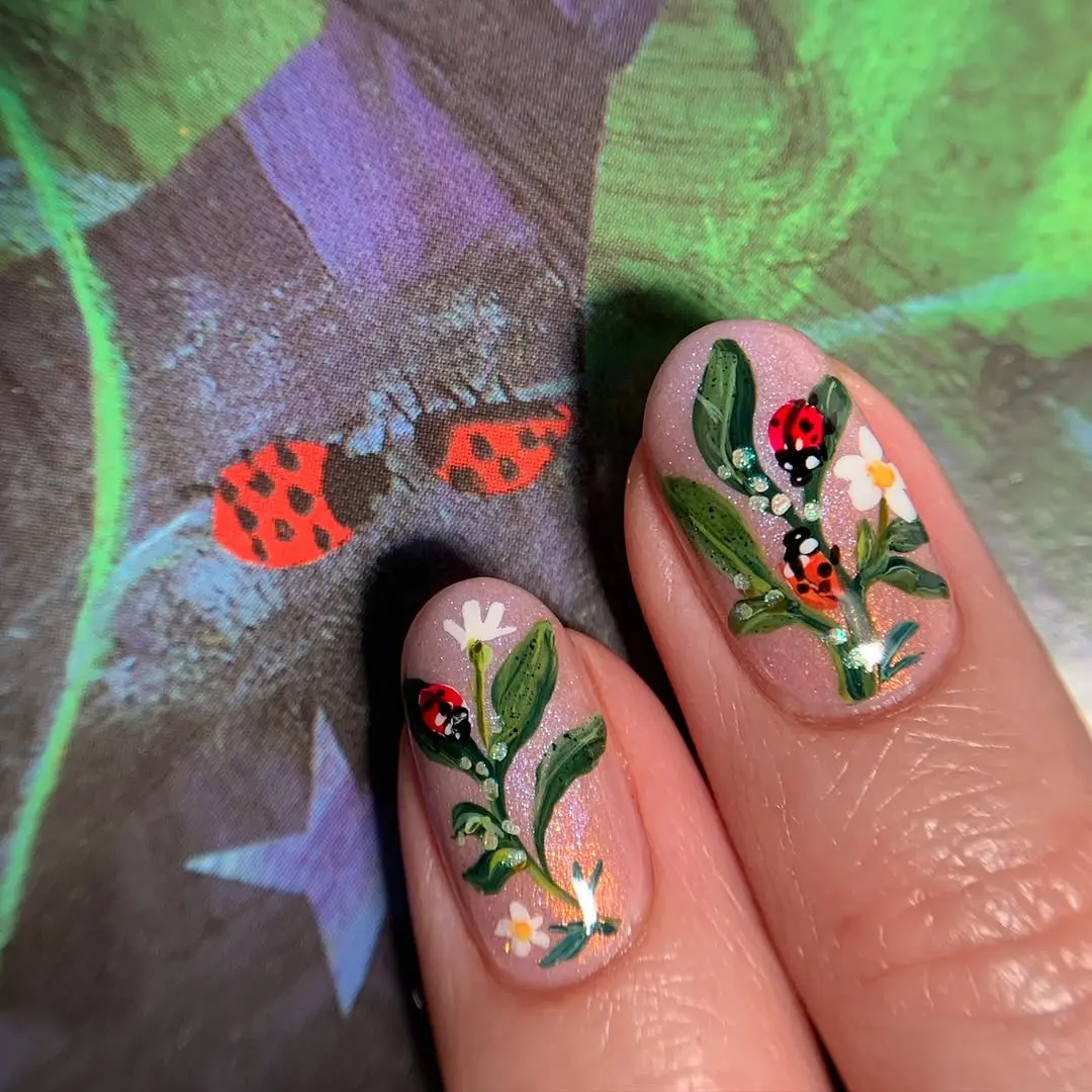 Charming ladybug garden nail art inspiration