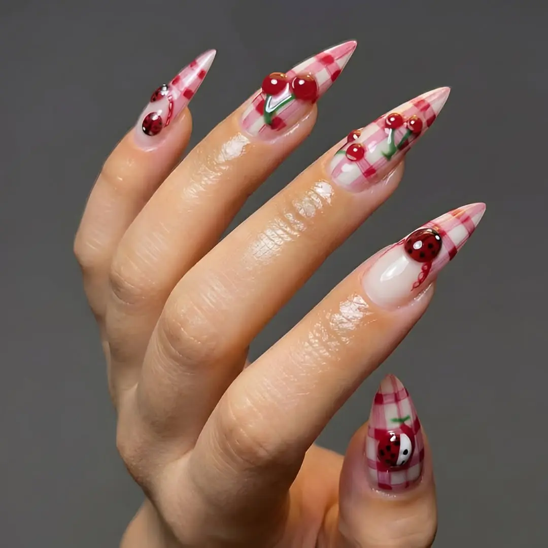 Charming ladybug and cherry nail design
