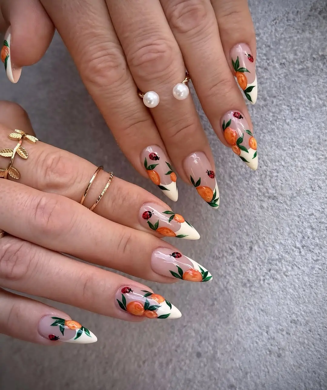 Charming ladybug nail art with floral designs
