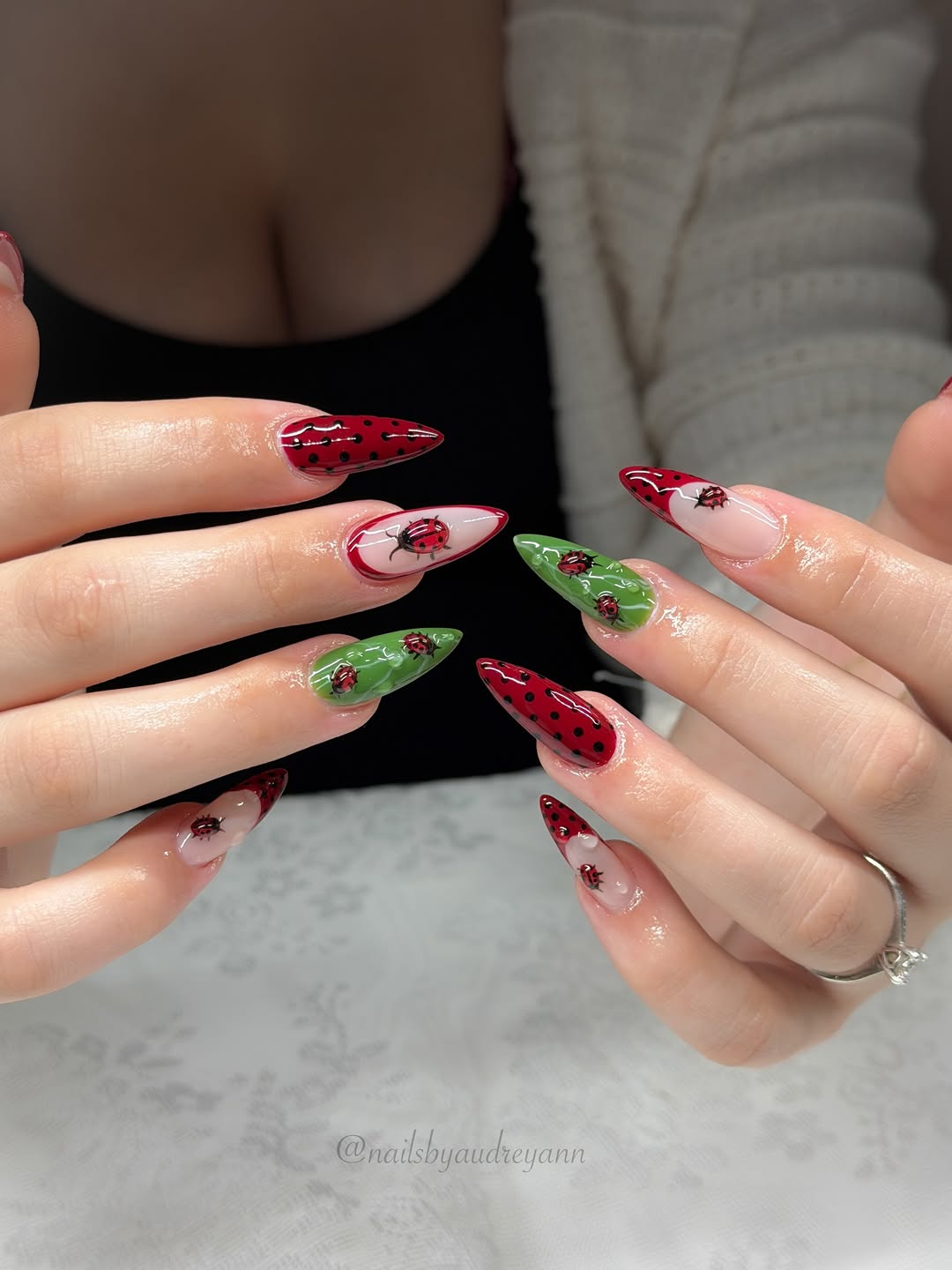 Charming ladybug nail art design for summer