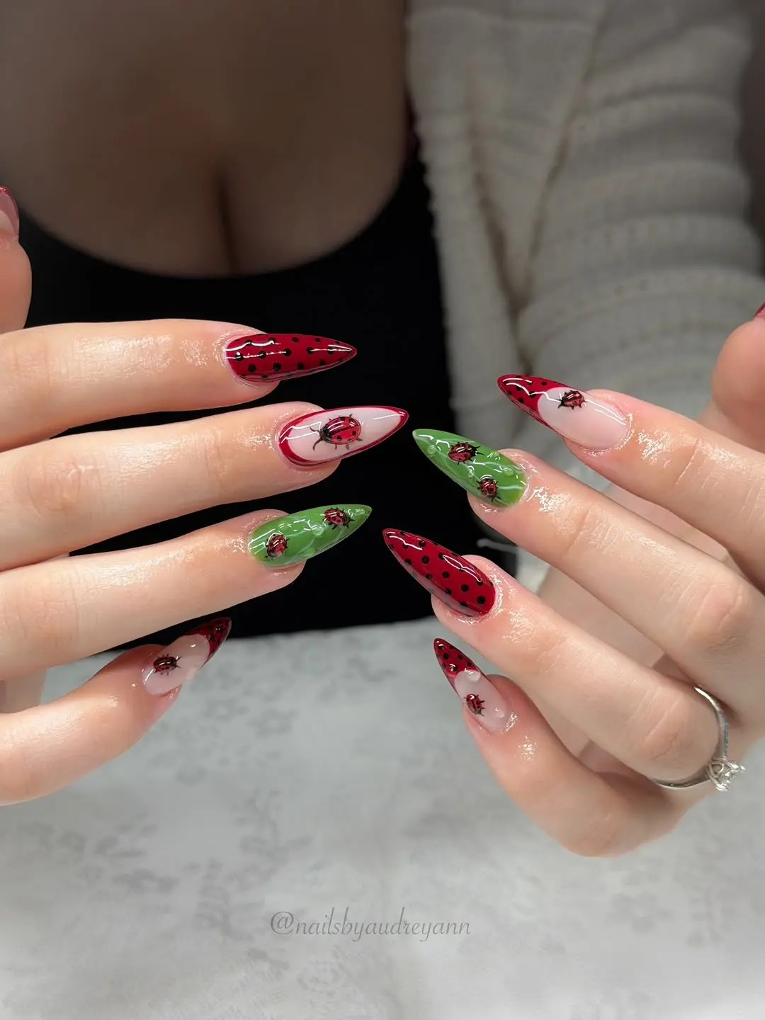 Charming ladybug nail art design for summer