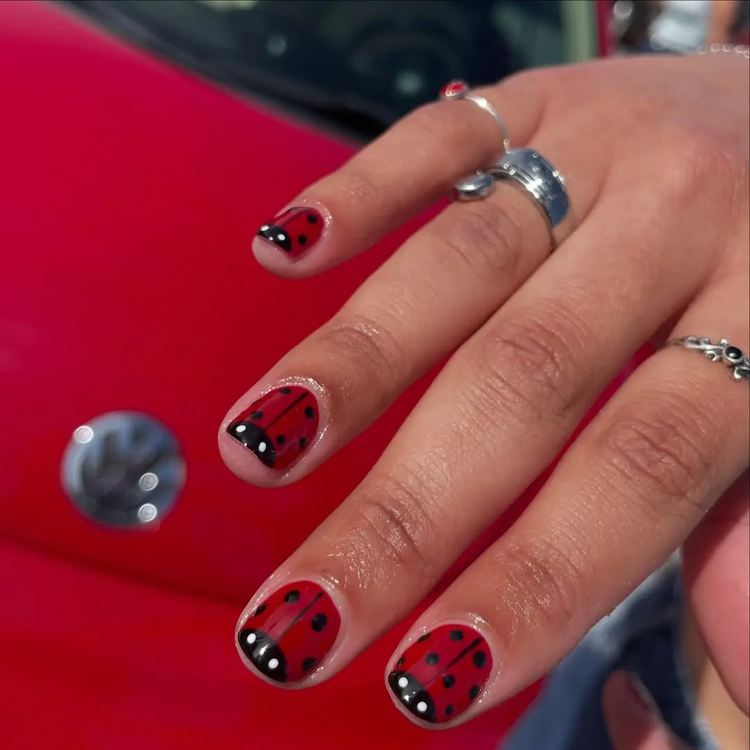 Charming ladybug nails with vibrant colors