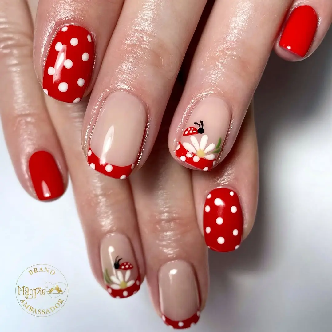 Cute ladybug and flower nail art design