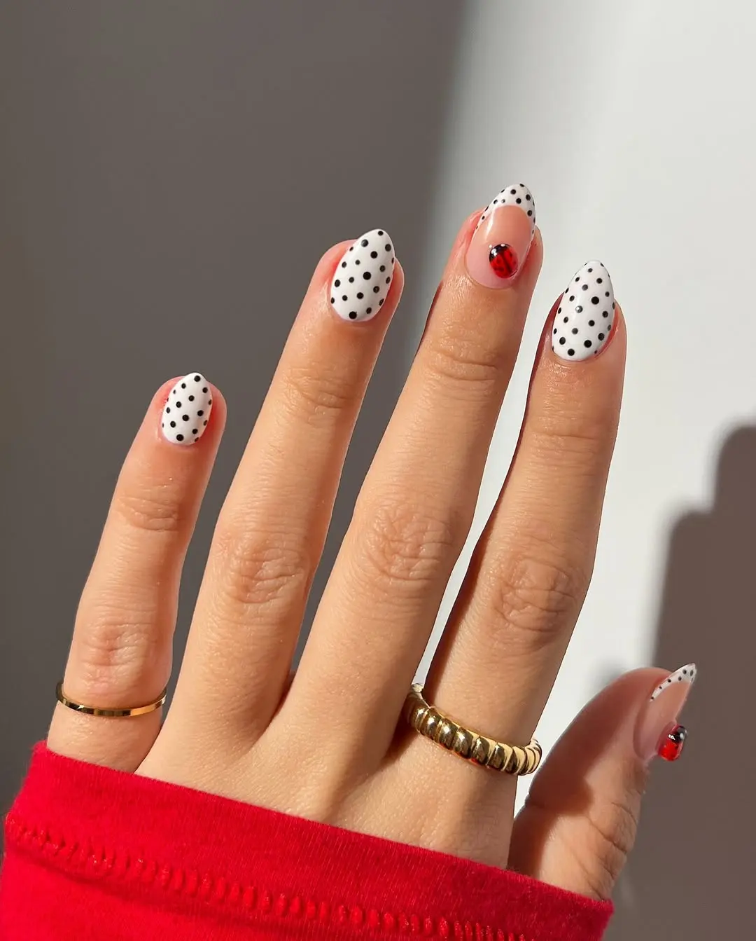 Charming ladybug designs on polka dot nails