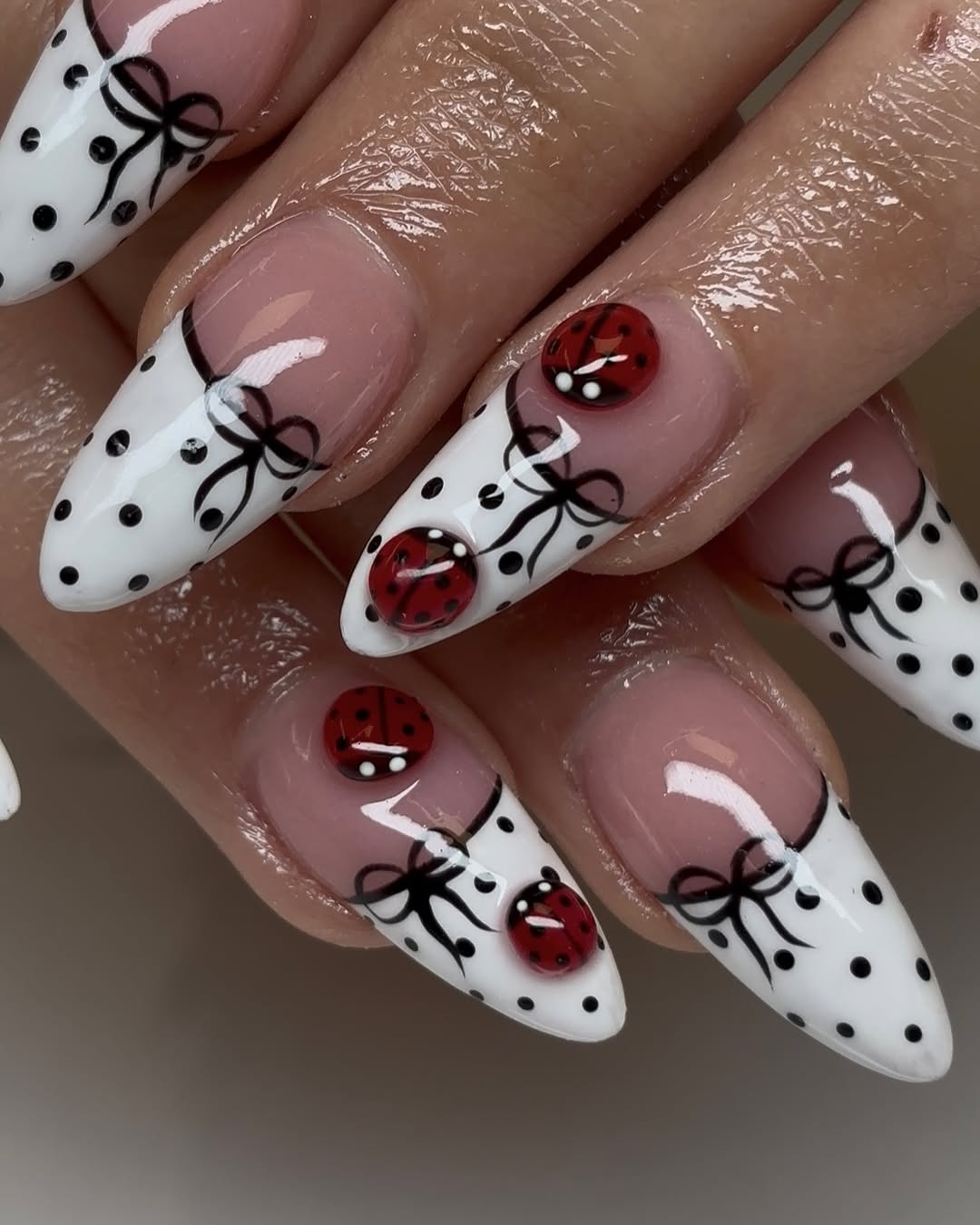Charming Ladybug Nail Art with Bows