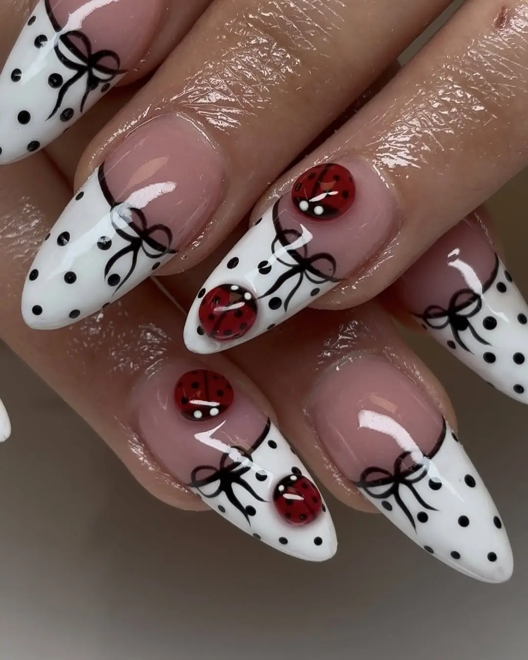 Charming Ladybug Nail Art with Bows