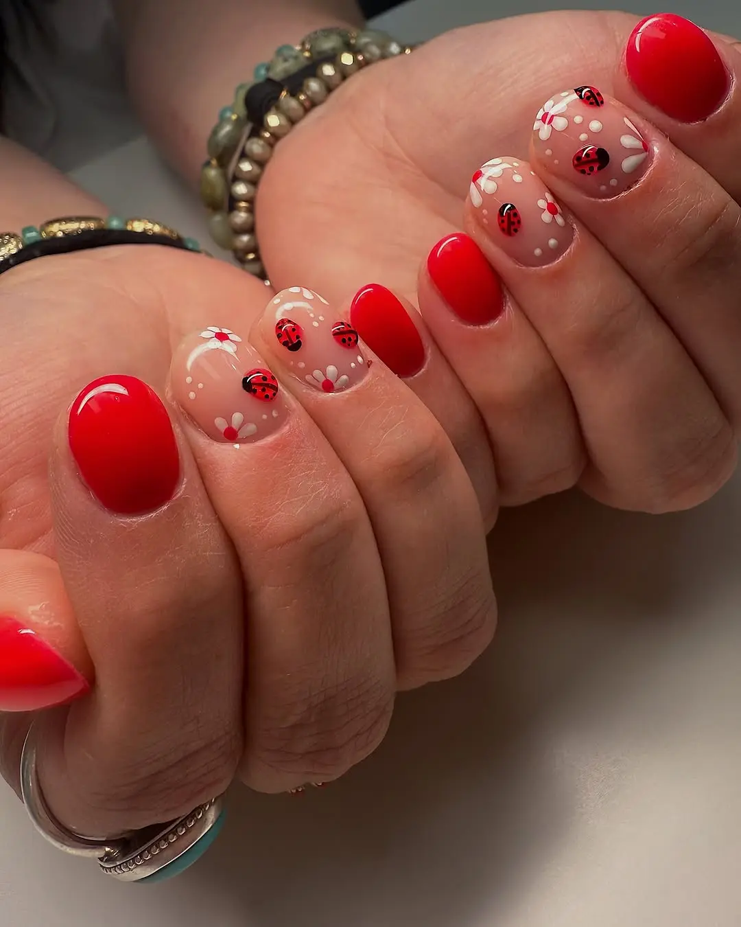 Charming ladybug nail art for a playful touch