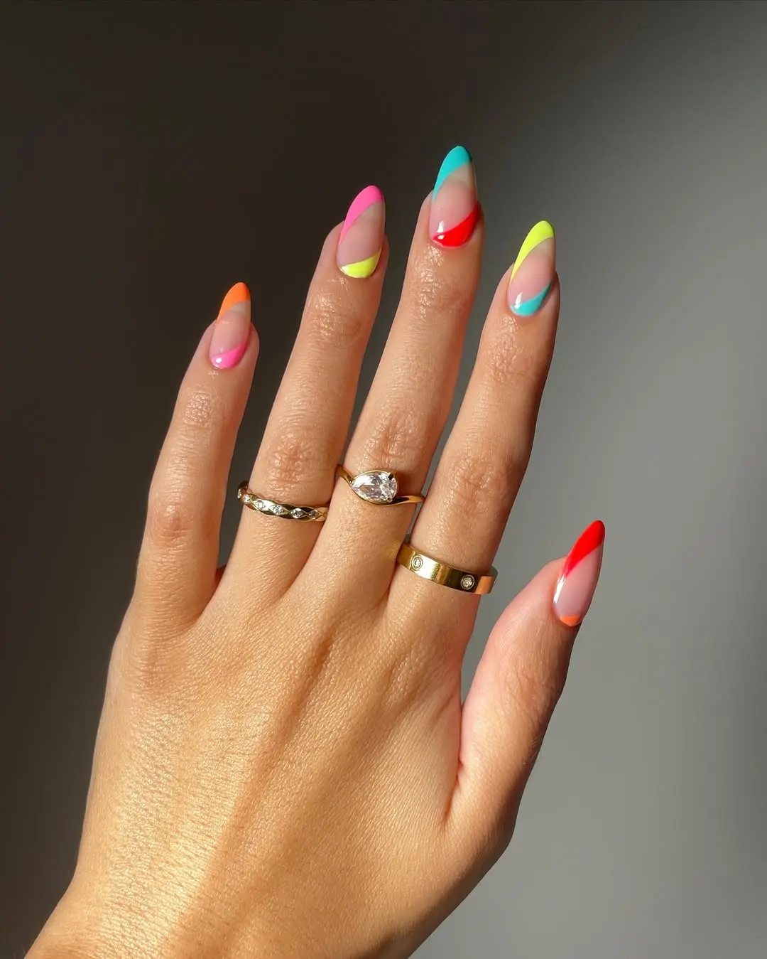 Vibrant neon nails with playful designs