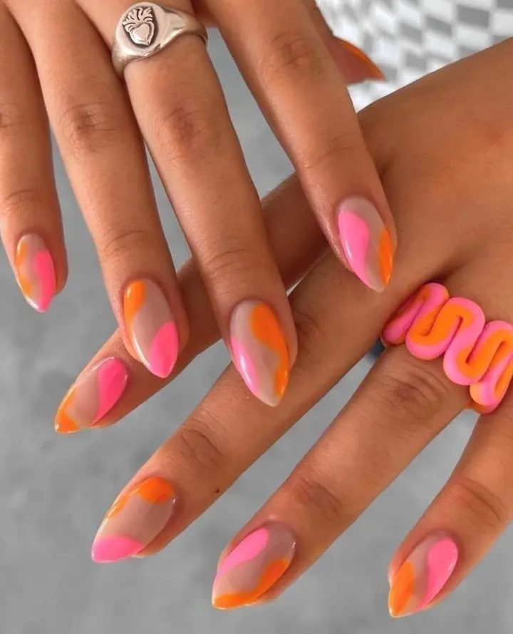 Vivid neon nails with artistic waves