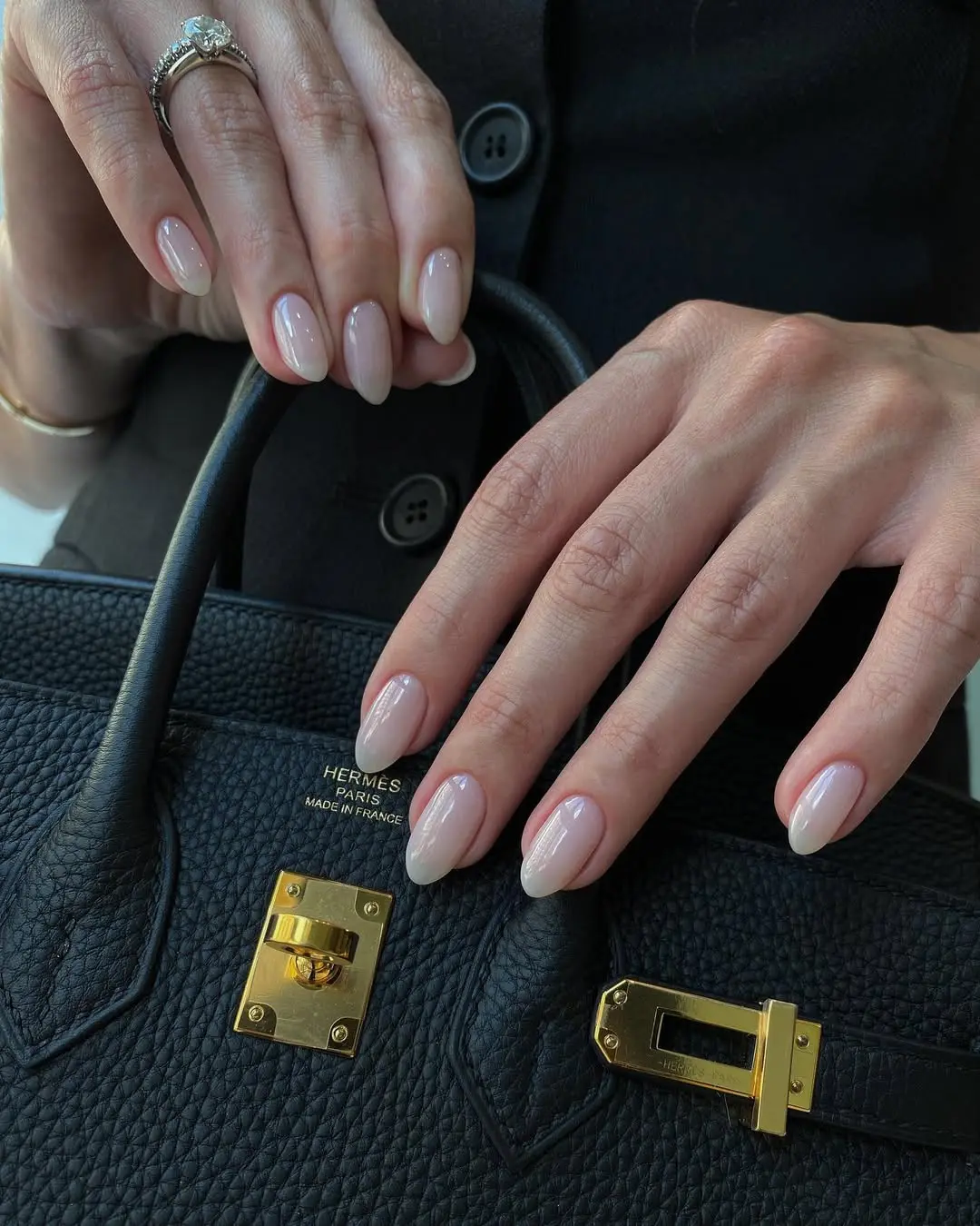 Elegant nude nails with a touch of glamour