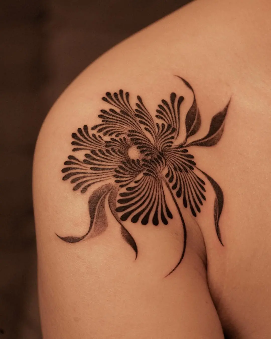 Intricate black ink peony tattoo design