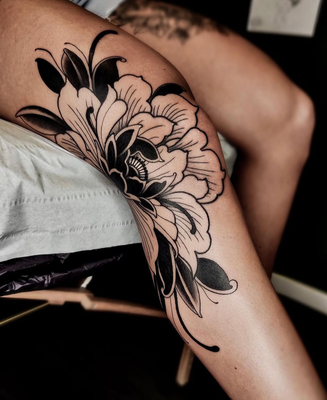 Bold Peony Tattoo Enhancing Leg Aesthetics