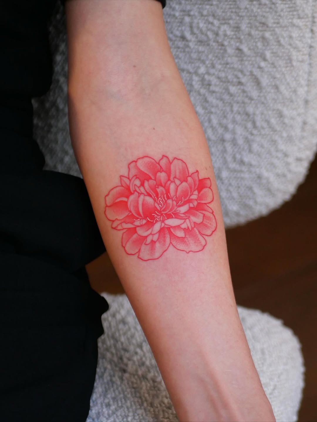 Vibrant Red Peony Tattoo on Arm