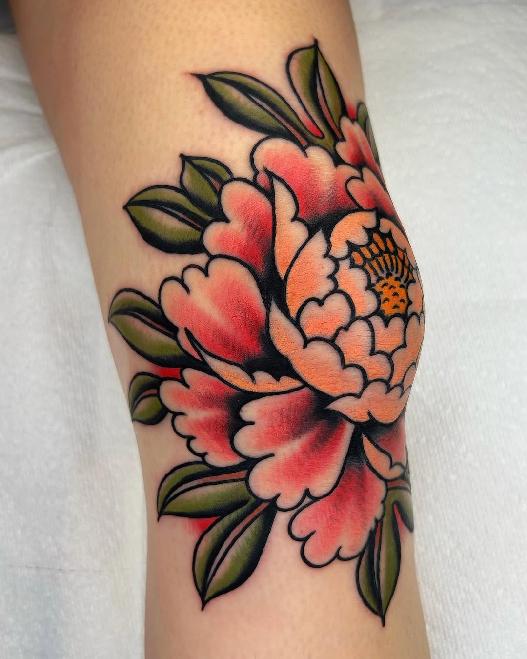 Stunning Peony Tattoo with Bold Colors
