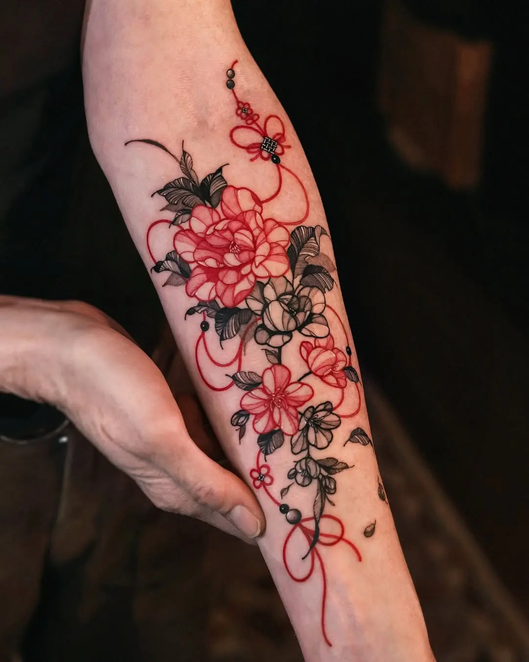 Elegant peony tattoo with intricate detailing