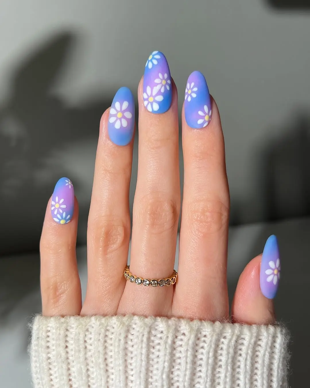 Charming periwinkle nails with floral accents