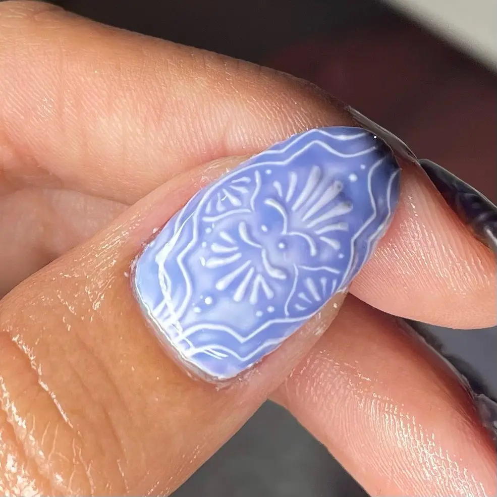 Charming Periwinkle Nails with Elegant Design