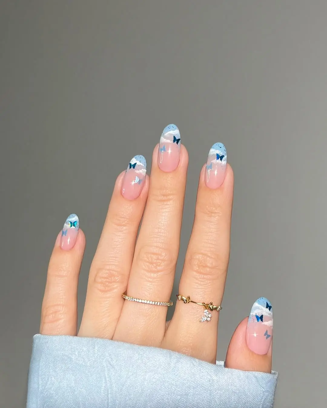 Charming Periwinkle Nails with Butterfly Accents