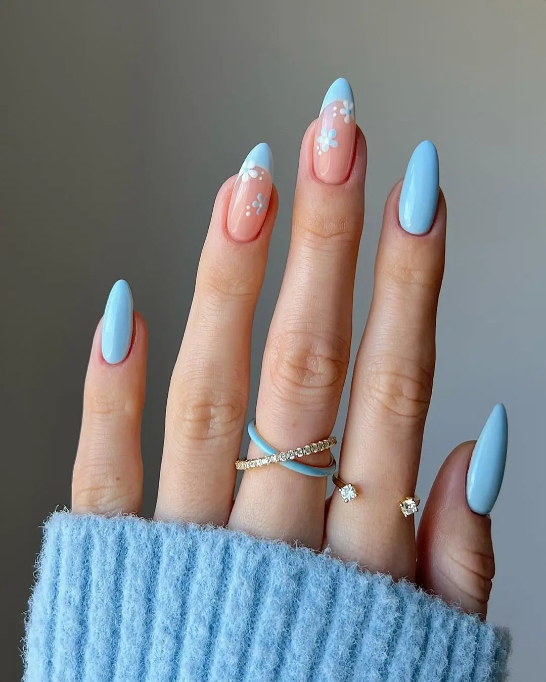 Charming periwinkle nails with delicate floral accents