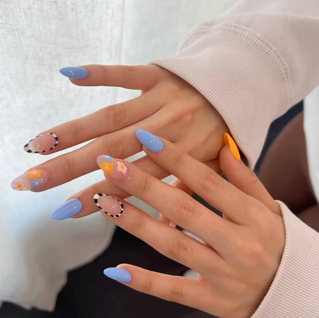 Charming periwinkle nails with floral accents