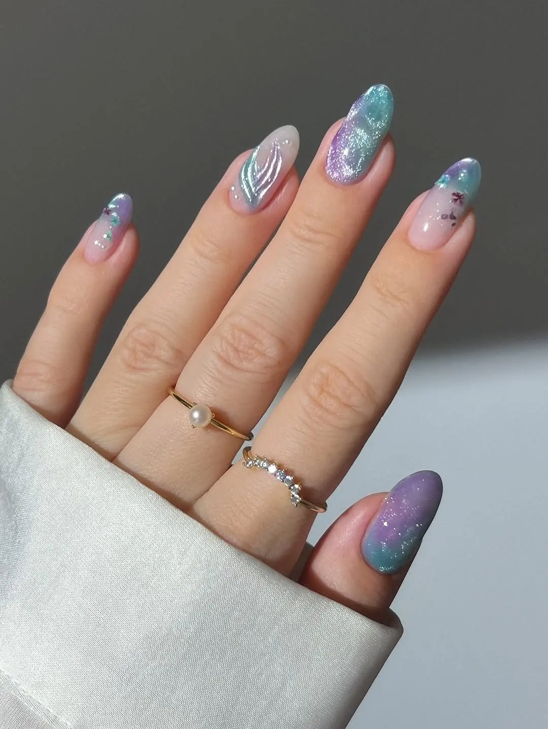 Chic Periwinkle Nails With Elegant Glitter Design