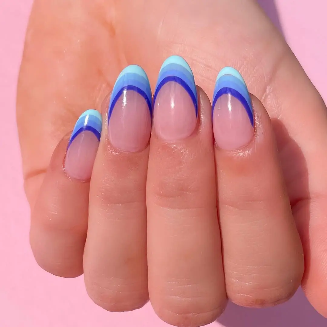 Trendy periwinkle ombre French manicure design