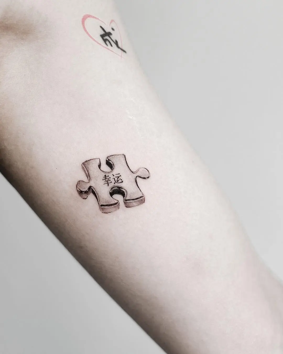 Intricate puzzle piece tattoo with symbolism