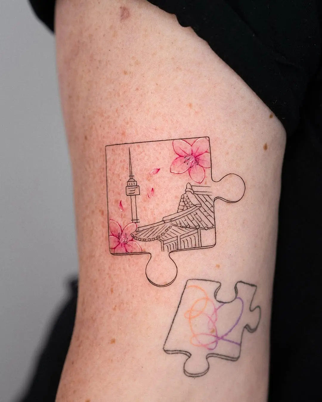 Unique floral puzzle tattoo with landscape scene