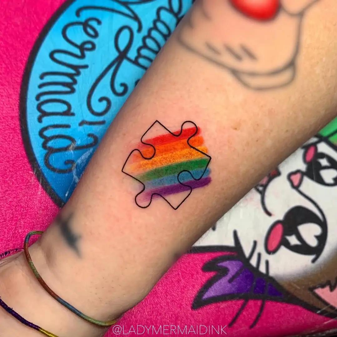 Colorful puzzle tattoo with rainbow vibes