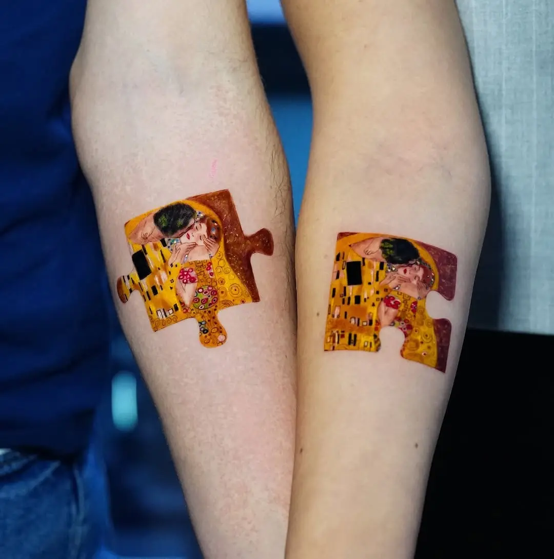 Matching puzzle piece tattoos for couples