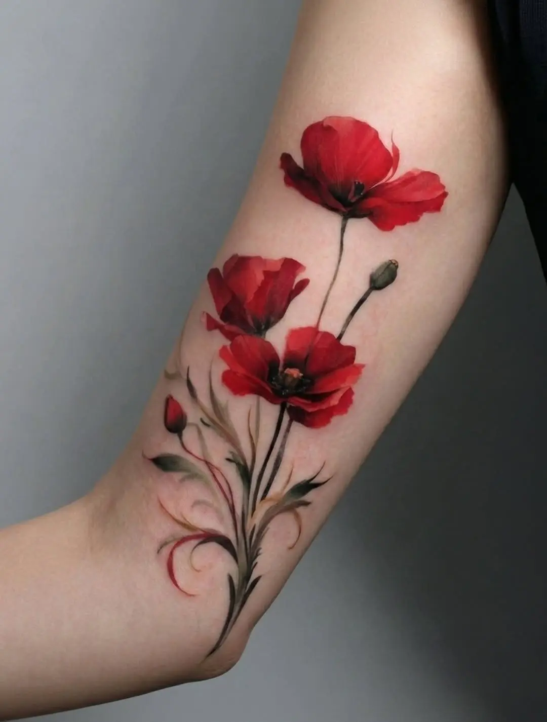 Stunning red poppy tattoo showcasing floral beauty