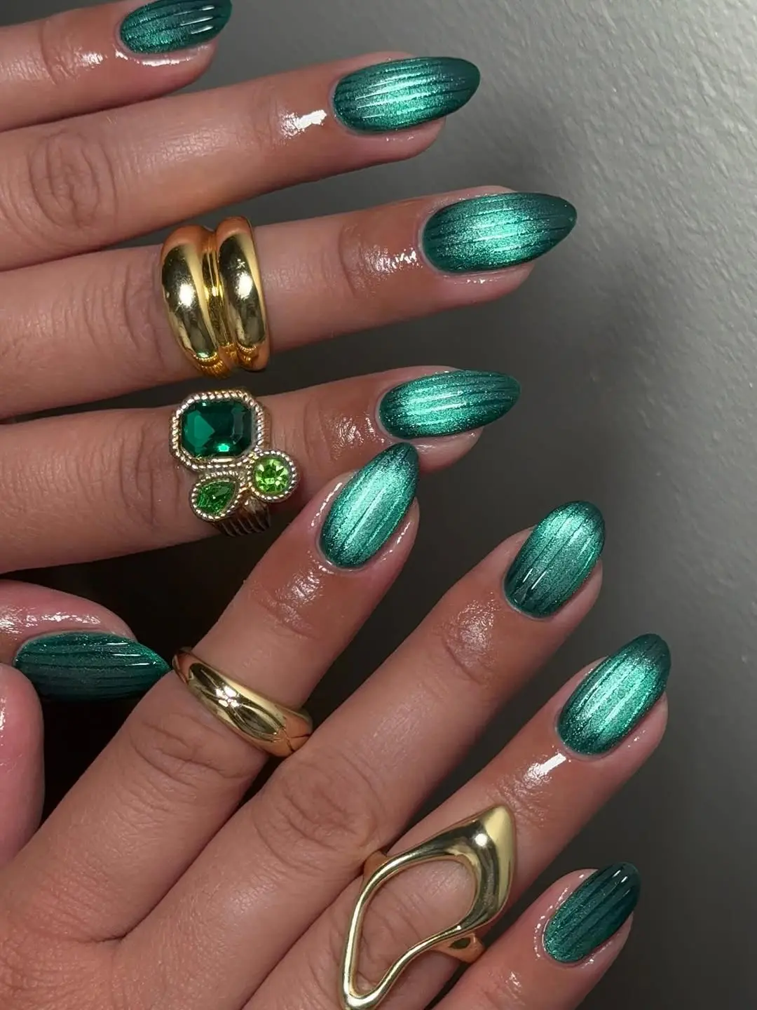 Vibrant aqua ribbed glass nail design