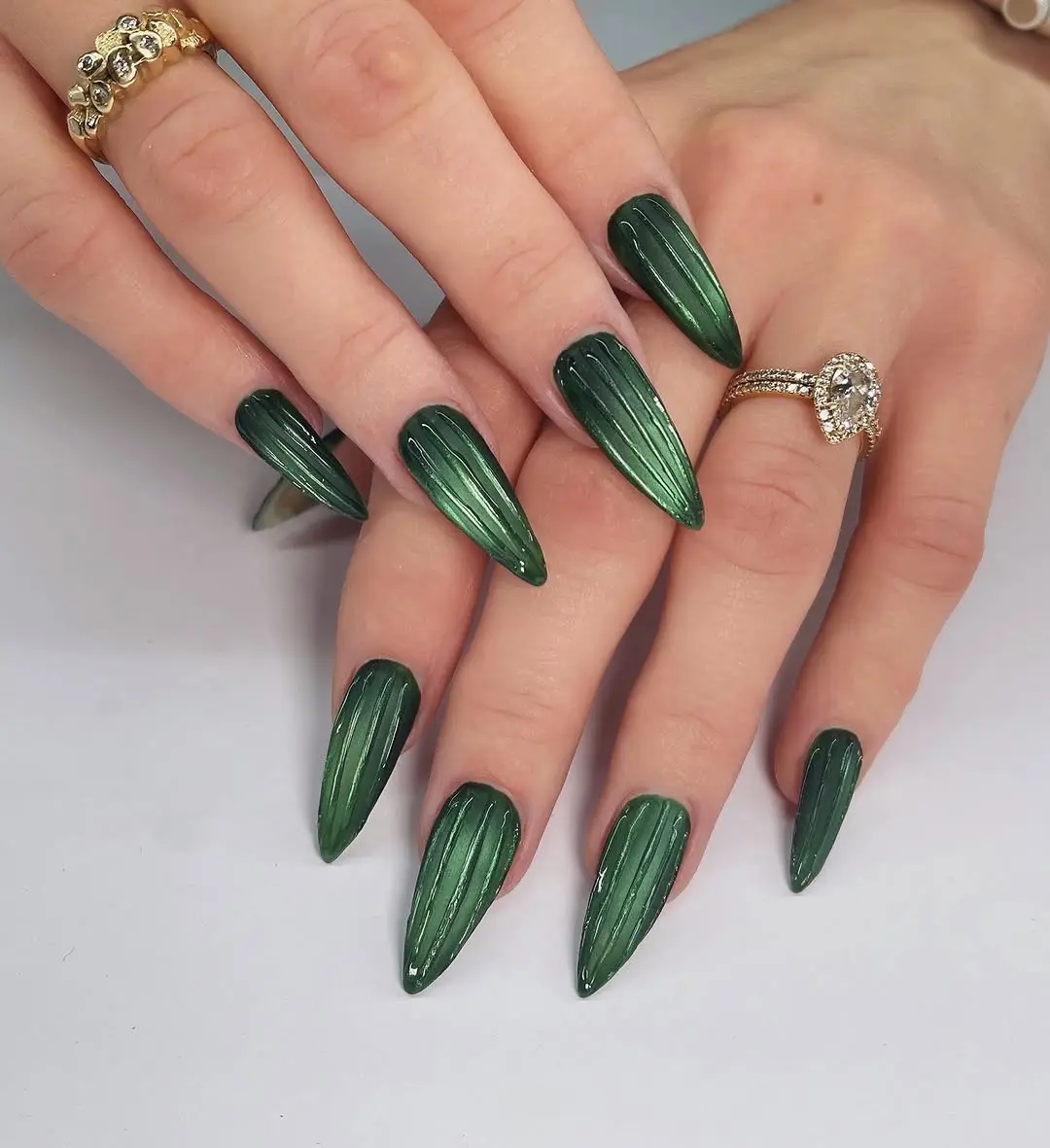 Elegant ribbed glass nails in deep green shade