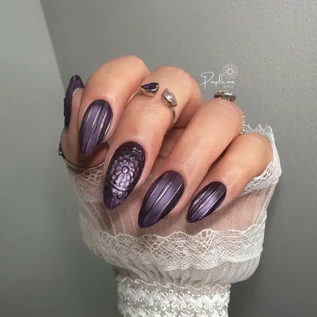 Stylish ribbed glass nails in deep purple hues