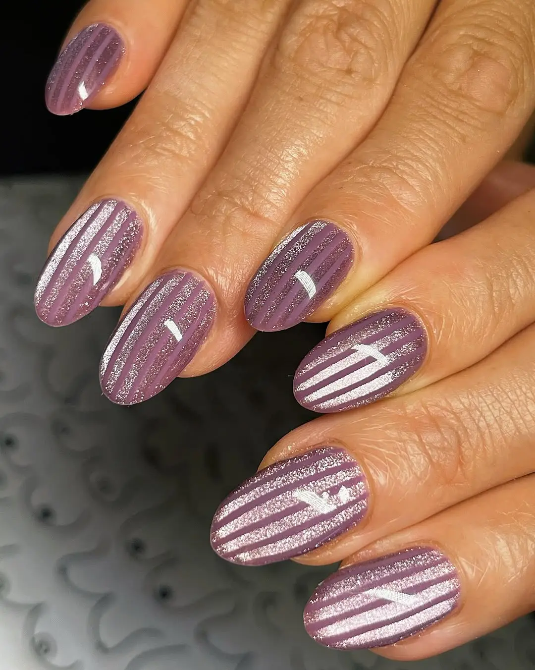 Chic ribbed glass nails with shimmering details