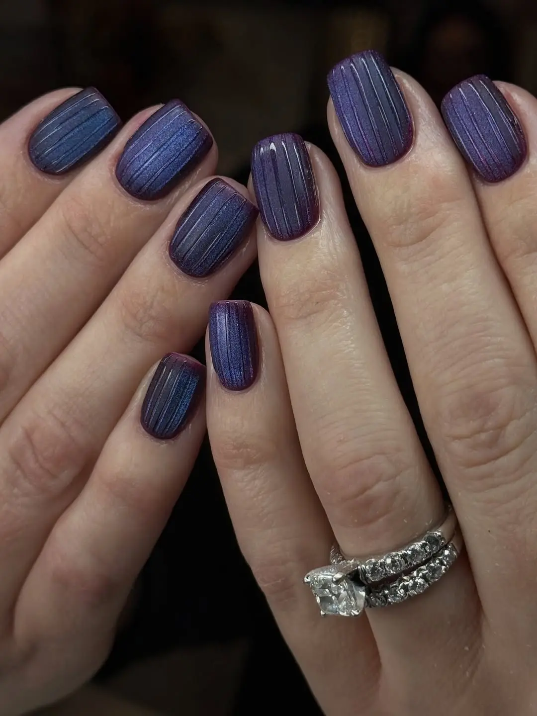 Stylish ribbed glass nails in purple hues