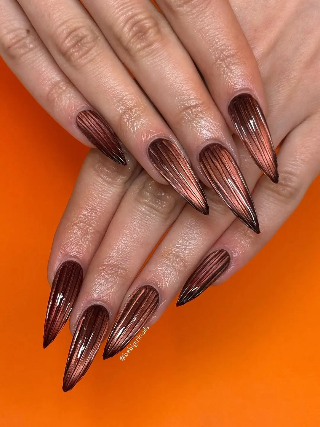 Elegant ribbed glass nails in copper ombre