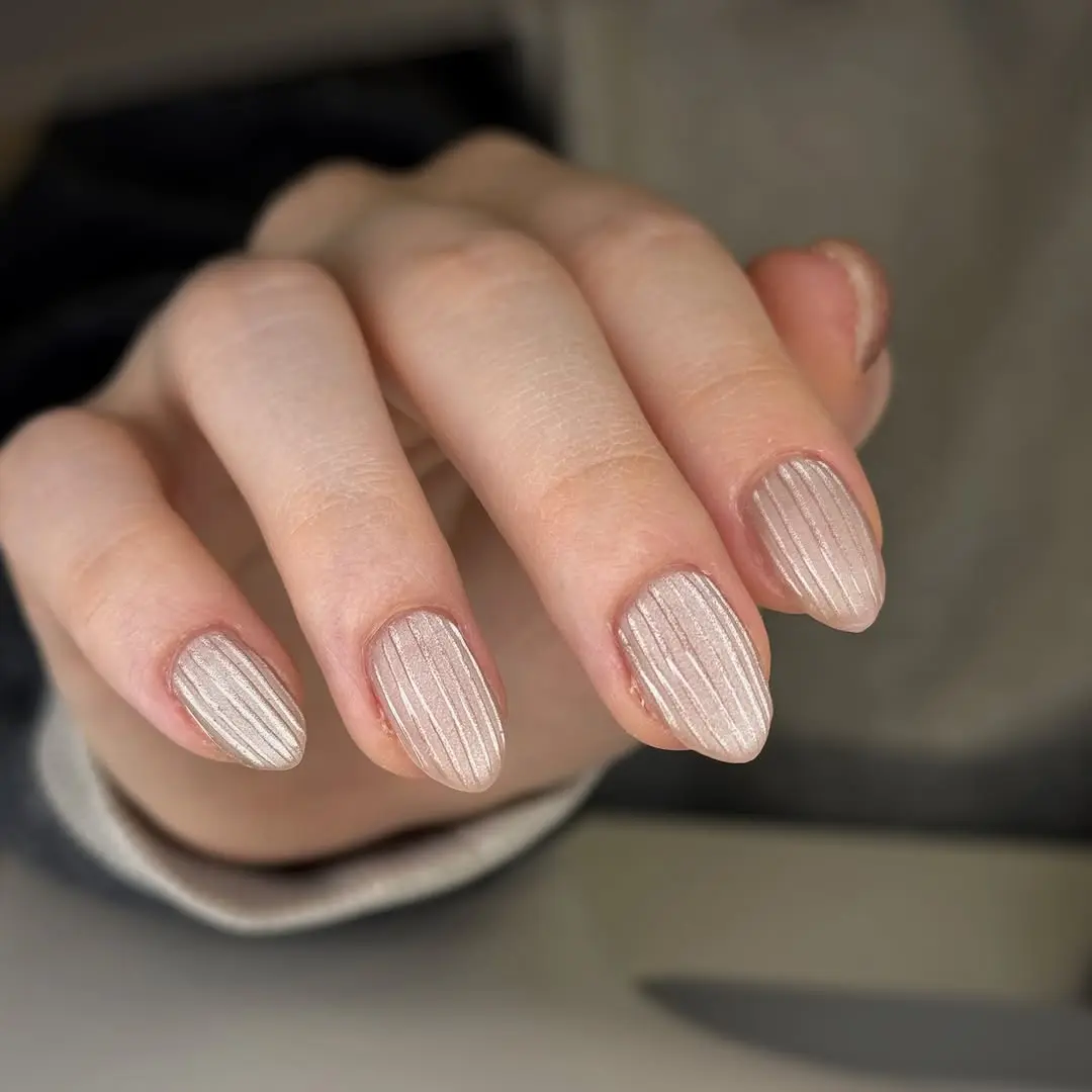 Trendy ribbed glass nail design in natural light