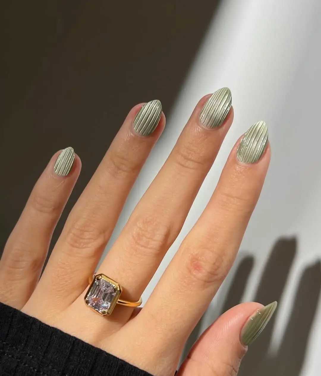 Chic ribbed glass nails for a trendy look.