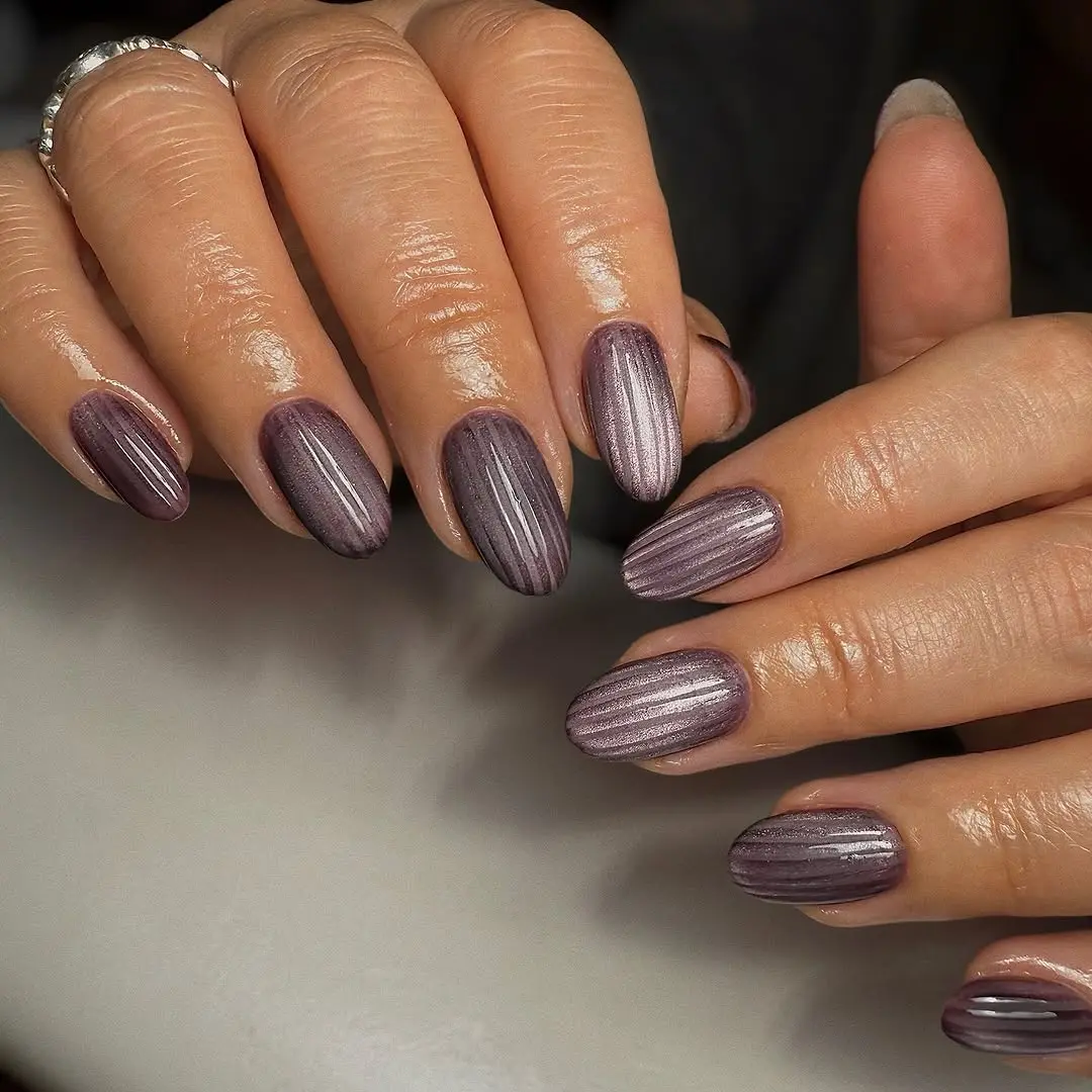 Elegant ribbed glass nails in soft purple hues